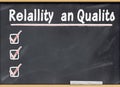 Blackboard with a checklist Reliability, Service and Quality Royalty Free Stock Photo