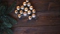 Blackboard with christmas tree twigs and balls. Xmas and Happy New Year composition. Flat lay, top view.