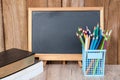 Blackboard, crayon, in boxes and books Educational concepts The education of rural children