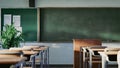 Blackboard, desks and chairs in empty school classroom, 3d rendering Royalty Free Stock Photo