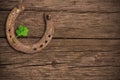 Blackboard with four-leaved clover, horse shoe Royalty Free Stock Photo