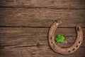 Blackboard with four-leaved clover and a horse shoe Royalty Free Stock Photo