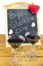 Blackboard with hearts and and a wine glass