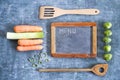 Blackboard, kitchen utensils, foods Royalty Free Stock Photo