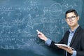 Instructors are teaching mathematics. Right hand holds chalk. Royalty Free Stock Photo