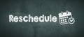 Blackboard with message RESCHEDULE Royalty Free Stock Photo