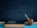 Blackboard , pencil and books. Royalty Free Stock Photo