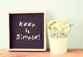 Blackboard with the phrase keep it simple written on it. Royalty Free Stock Photo