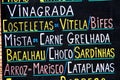 Blackboard of a Portuguese bar or restaurant named after typical Portuguese foods