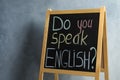 Blackboard with question Do You Speak English on grey background Royalty Free Stock Photo
