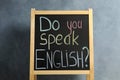 Blackboard with question Do You Speak English on grey background Royalty Free Stock Photo