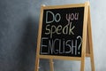 Blackboard with question Do You Speak English on grey background Royalty Free Stock Photo