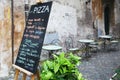 Blackboard & tables of a pizzeria in Rome