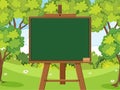 Blackboard template design with many green trees in forest Royalty Free Stock Photo