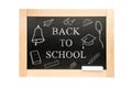 Blackboard with text back to school and drawings. School Board in wooden frame isolated on white background Royalty Free Stock Photo