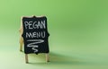 Blackboard with text `Pegan menu`. Paleo and vegan menu concept. Royalty Free Stock Photo