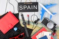 blackboard with text & x22;Spain& x22;, plane, map, passport, money, watch Royalty Free Stock Photo