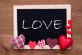 Blackboard With Textile Hearts, Text Love