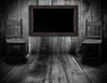 Blackboard and wood chair in interior room with gray wooden wall Royalty Free Stock Photo