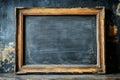 Blackboard with wooden frame on a rustic background, evoking educational themes and vintage classroom settings Royalty Free Stock Photo