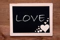 Blackboard With Wooden Hearts, Text Love