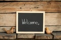 Blackboard writing on wooden background