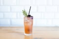 blackcurrant soda in a clear glass with a bendable straw Royalty Free Stock Photo