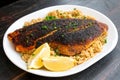 Cajun-style Blackened Red Snapper on Dirty Rice