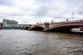 Blackfriars Bridge Crossing River Thames With Unilever House In Background