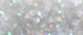 Blackground of abstract glitter lights. silver and gold. de-focused. banner