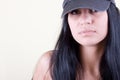 Blackhair women in sport cap