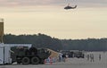 Blackhawk helicopter over military installation