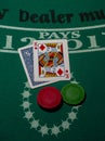 Blackjack cards with a king face up on a backjack table Royalty Free Stock Photo