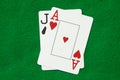 Blackjack hand on green table Royalty Free Stock Photo