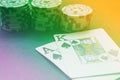 Blackjack playing cards hand on colorful background with chips s Royalty Free Stock Photo