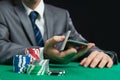 Blackjack Or Poker Game, Casino Worker Shuffling Cards Royalty Free Stock Photo