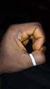 Blackman hand with white finger band