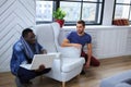 Blackman and white guy warking with laptop. Royalty Free Stock Photo