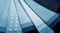 blackout drapery samples with different textures in blue color swatch, close up view. Royalty Free Stock Photo