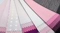 blackout drapery samples with different textures in soft pink color tone, close up view. Royalty Free Stock Photo