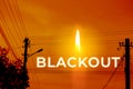 Blackout, power grid overloaded. Blackout concept. Earth hour. Burning flame candle and power lines on background Royalty Free Stock Photo