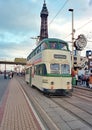 Blackpool Balloon Electric tram No702 and the Iconic Blackpool Tower 1990\'s Royalty Free Stock Photo