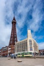 BLACKPOOL MAY 1 2023: Blackpool\'s World Famous Tower with a heritage tram passing in front of it Royalty Free Stock Photo