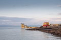 Blackrock public diving board. Salthill beach, Galway city, Ireland. Popular town landmark and swimming place. Calm morning light