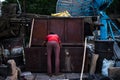 Blacksmith closing his workshop