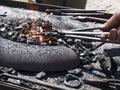 Blacksmith fire with resilient carbons Royalty Free Stock Photo