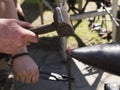 Blacksmith forge with hammer iron on anvil