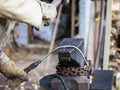 Blacksmith forges iron rod on an anvil Royalty Free Stock Photo