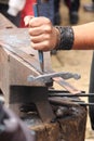 Blacksmith forging a sword Royalty Free Stock Photo