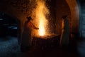 .Blacksmith forging in the traditional way, as in the past